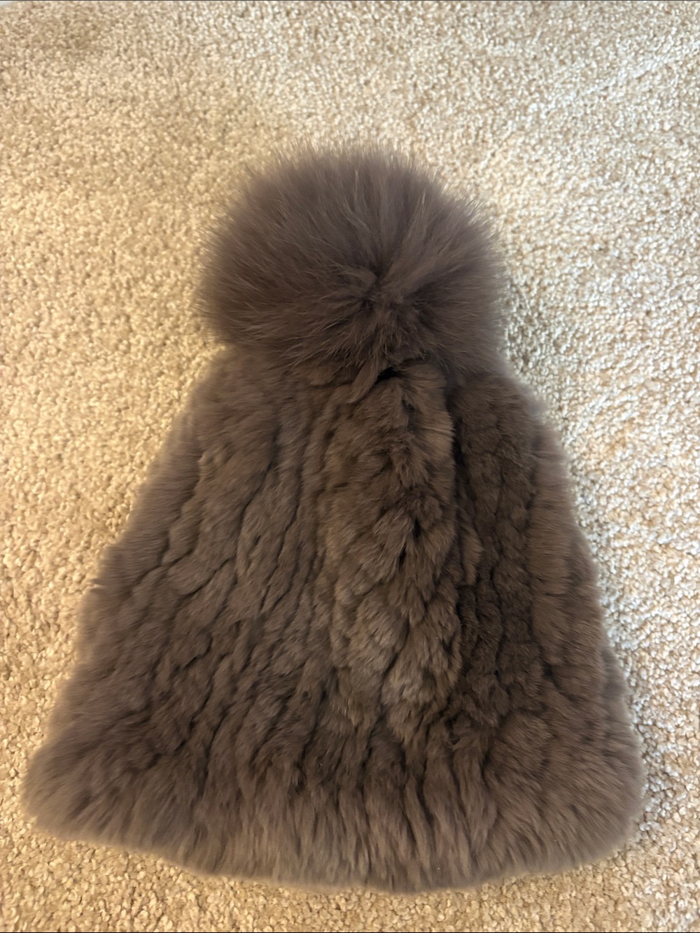Woman’s faux fur stretch hat plum in color!
